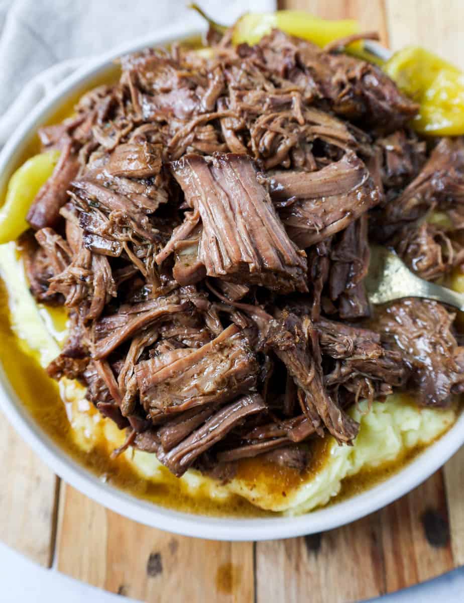 How to shred Mississippi Pot Roast with two forks. What to serve with Mississippi Pot Roast.