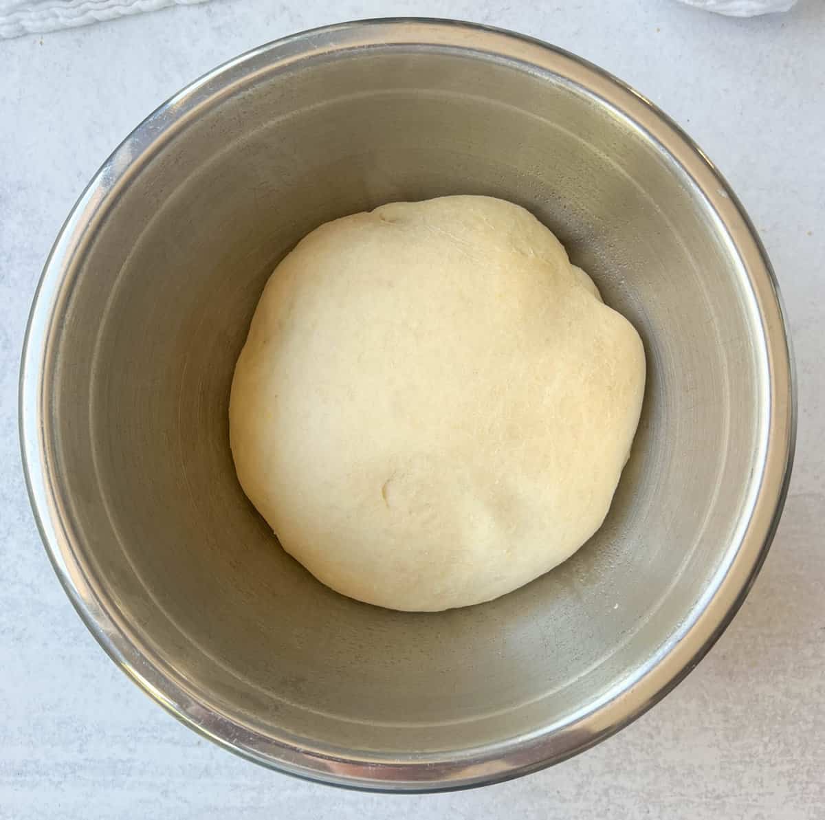 Parker House Dough Ball Rising. How to make homemade Parker House Rolls from scratch.