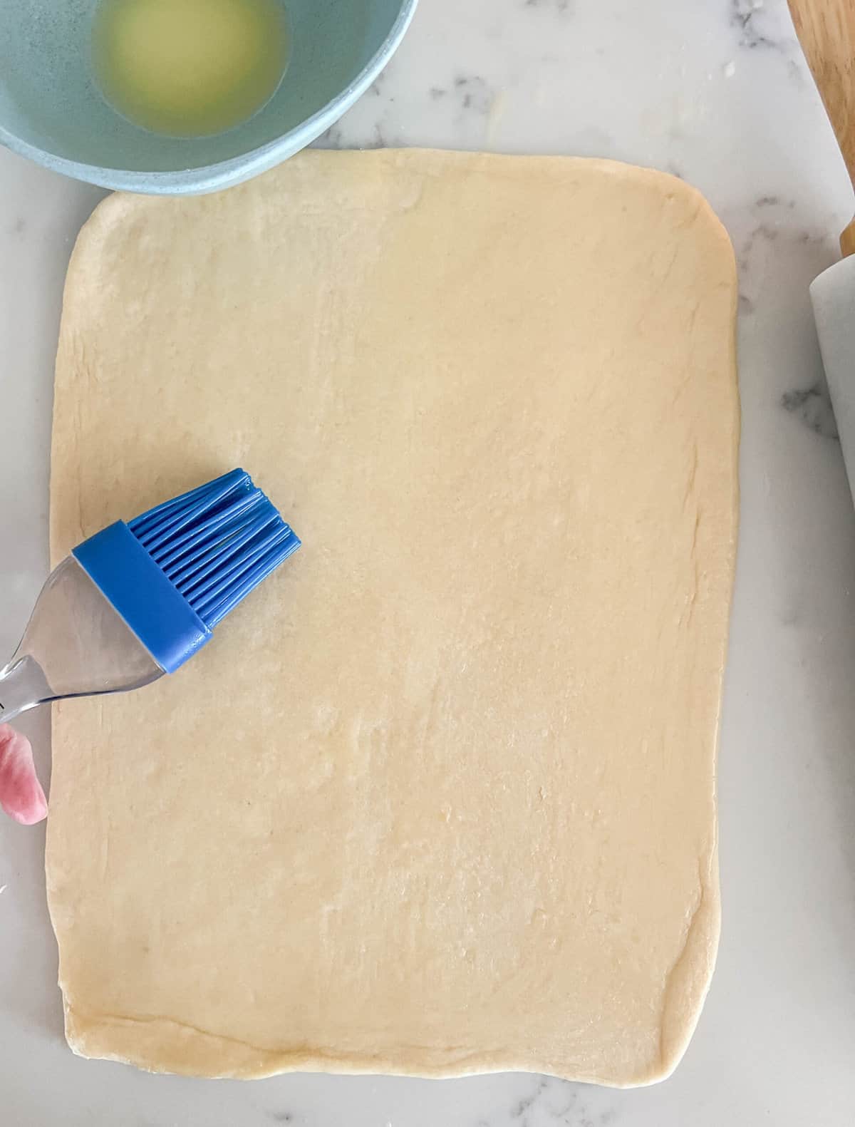 Parker House Dough Ball into rectangle. How to make homemade Parker House Rolls from scratch.