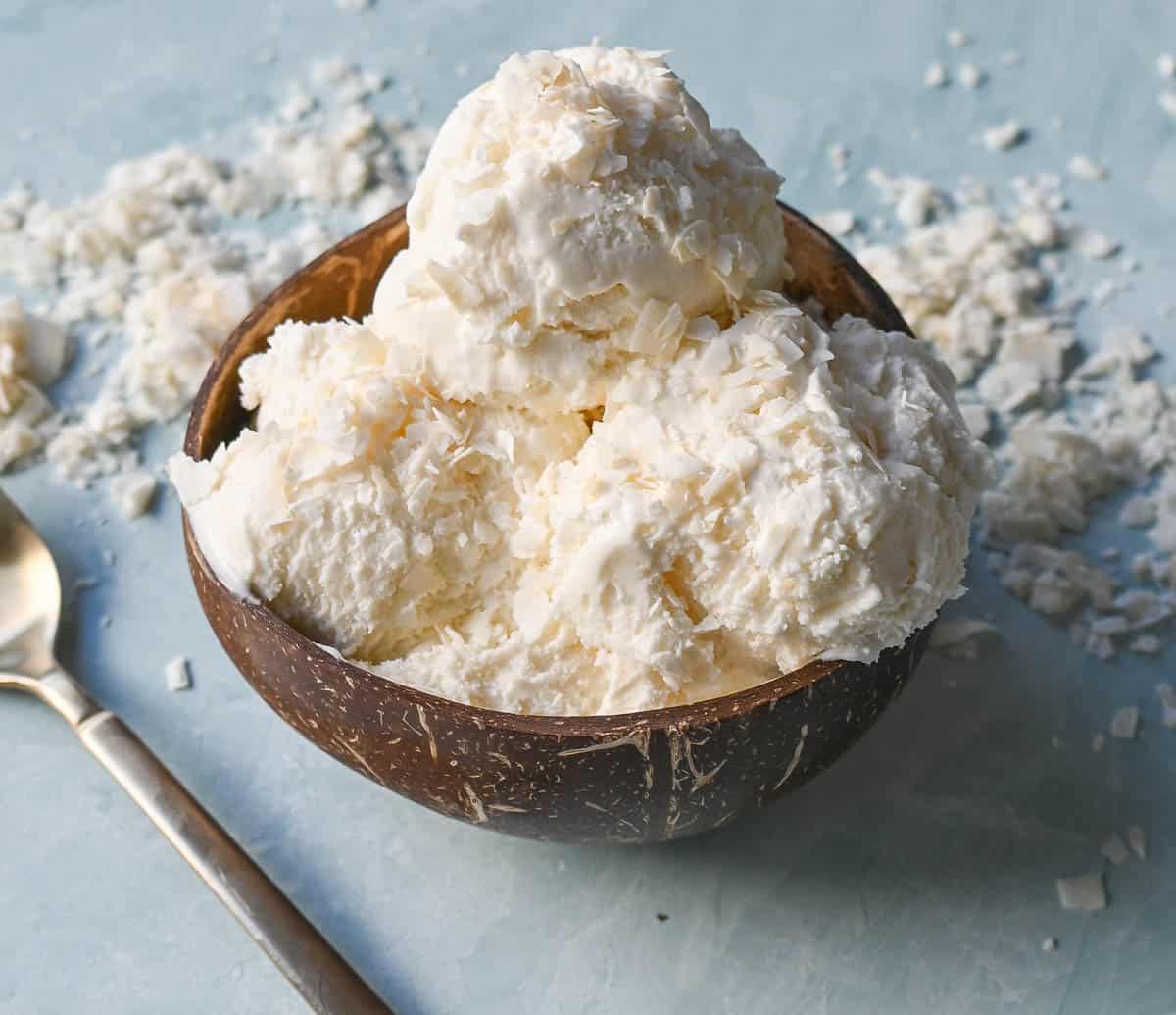 Easy no churn coconut ice cream is creamy, fresh, and flavorful. Made with only cream of coconut and heavy cream, this is the simplest coconut ice cream recipe. No ice cream maker required!