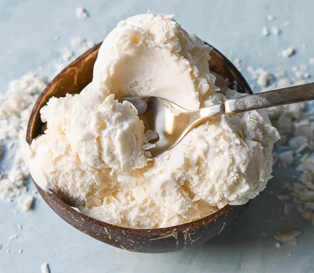Easy no churn coconut ice cream is creamy, fresh, and flavorful. Made with only cream of coconut and heavy cream, this is the simplest coconut ice cream recipe. No ice cream maker required!