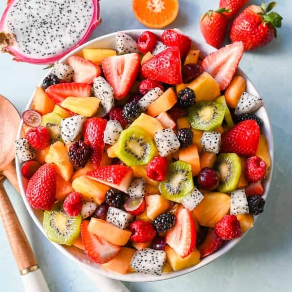 A bright and fresh fruit salad that is perfect for summertime! Made with vibrant and flavorful seasonal fruits and a sweet and simple honey lime dressing. The perfect fruit salad recipe!