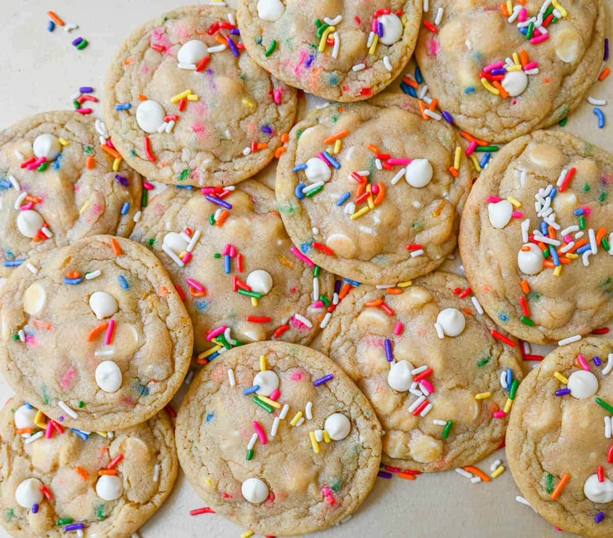 Soft, chewy sugar cookies filled with sprinkles and white chocolate. This festive funfetti cookie recipe has the perfect chewy center with buttery crisp edges filled with rainbow sprinkles. 