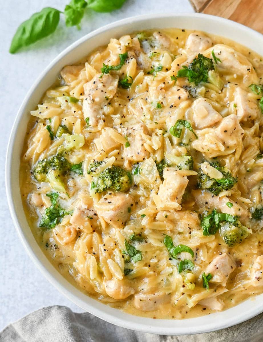 Creamy Chicken Broccoli Orzo made with sauteed chicken, fresh broccoli, orzo pasta in a cheesy sauce. This easy Cheesy Chicken Broccoli Orzo Skillet 30-minute meal is creamy and delicious!