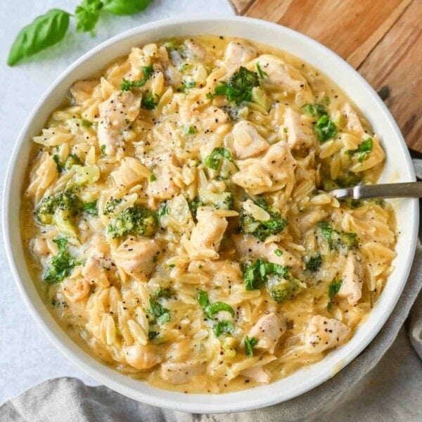 Creamy Chicken Broccoli Orzo made with sauteed chicken, fresh broccoli, orzo pasta in a cheesy sauce. This easy Cheesy Chicken Broccoli Orzo Skillet 30-minute meal is creamy and delicious!