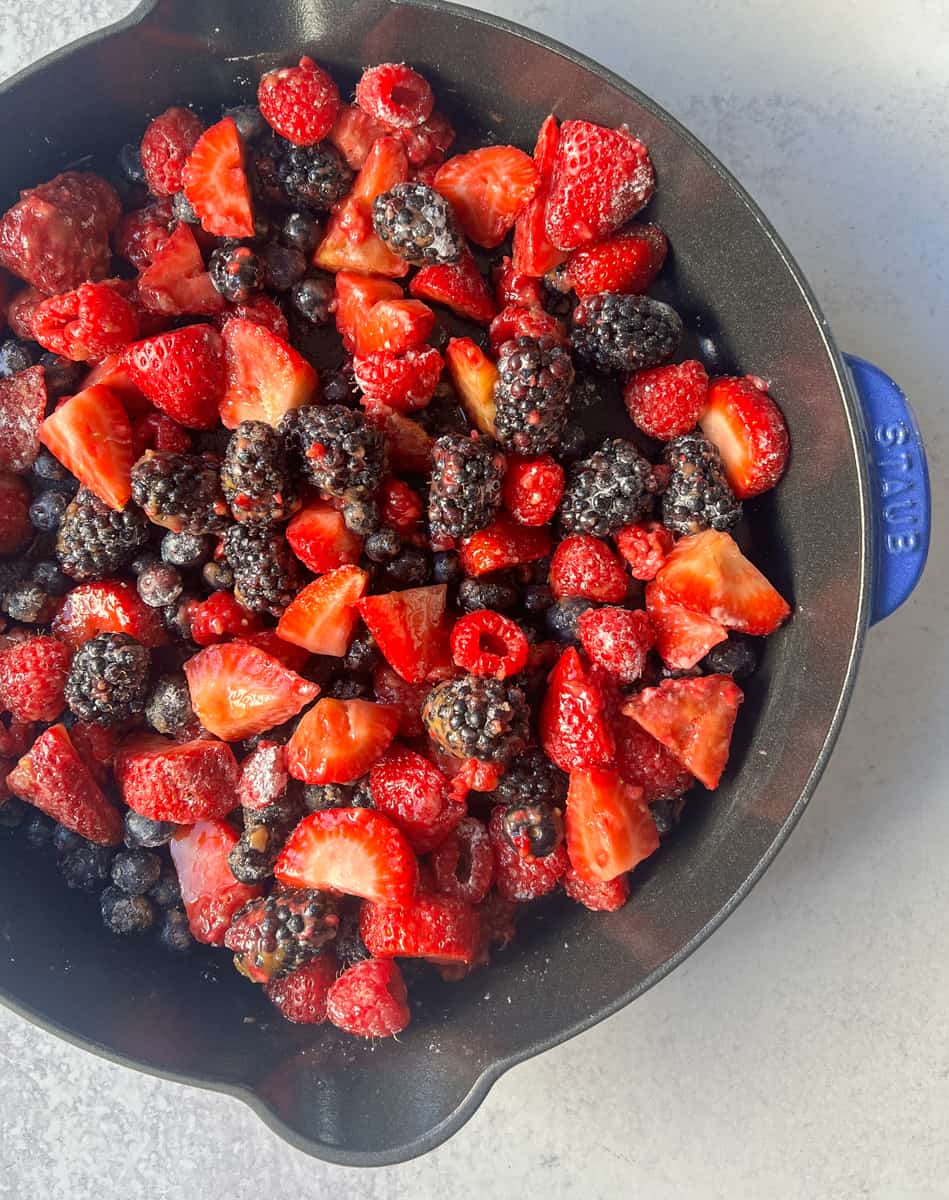 Fresh berries in berry crisp with crumble topping