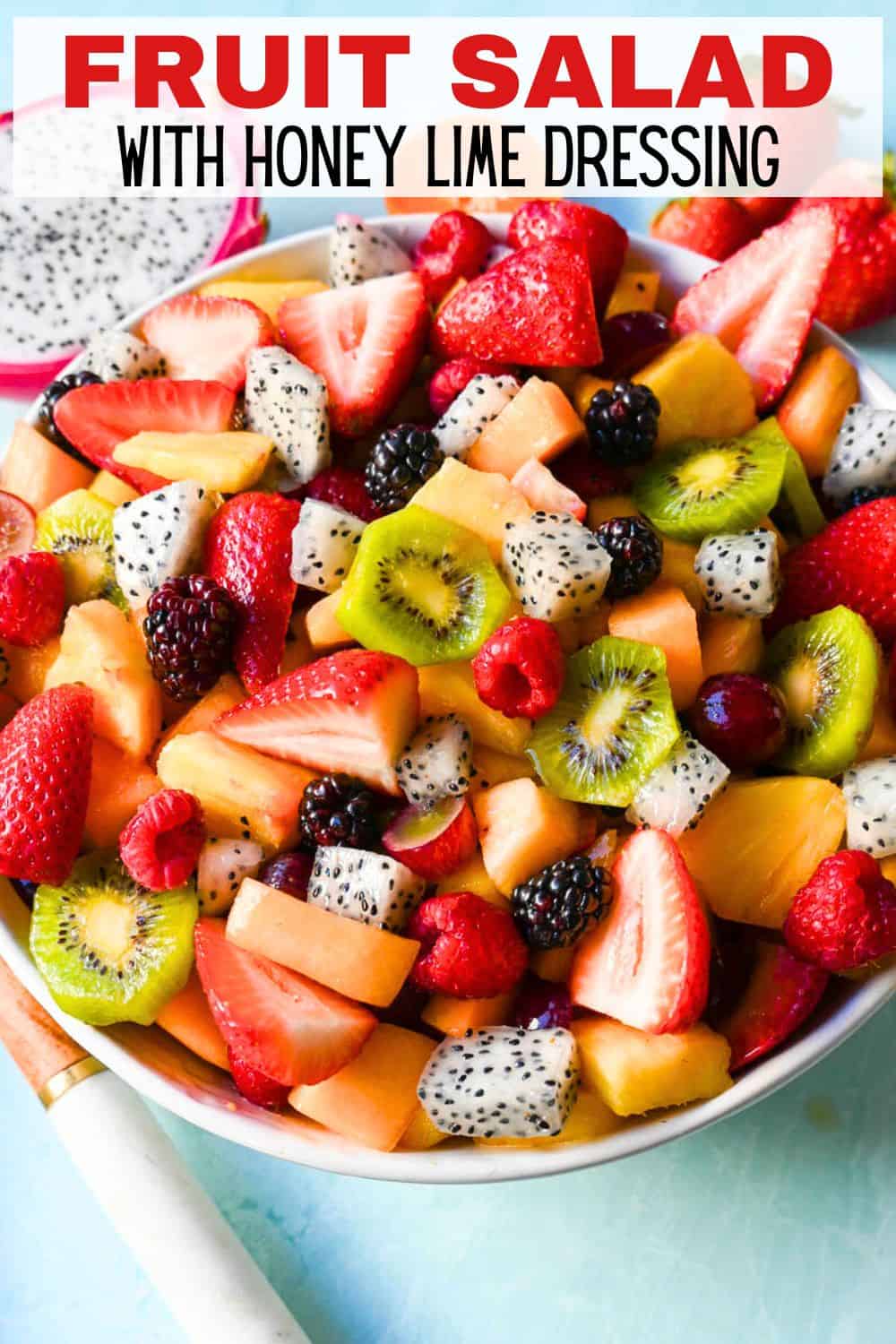 A bright and fresh fruit salad that is perfect for summertime! Made with vibrant and flavorful seasonal fruits and a sweet and simple honey lime dressing. The perfect fruit salad recipe!