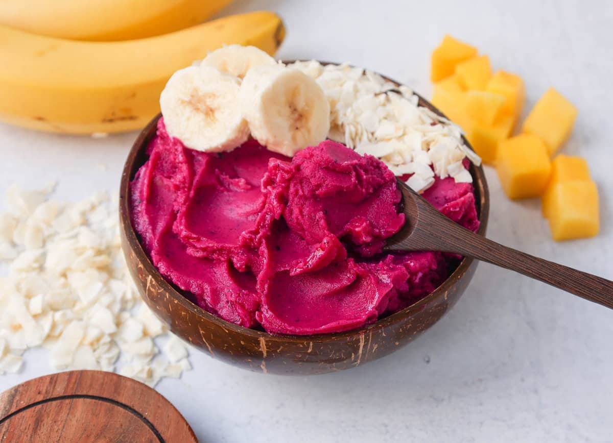 Dragon fruit (pitaya) smoothie bowls are a creamy frozen blend of tropical fruits topped with granolas, seeds, and other toppings that will give you healthy energy throughout the day. 