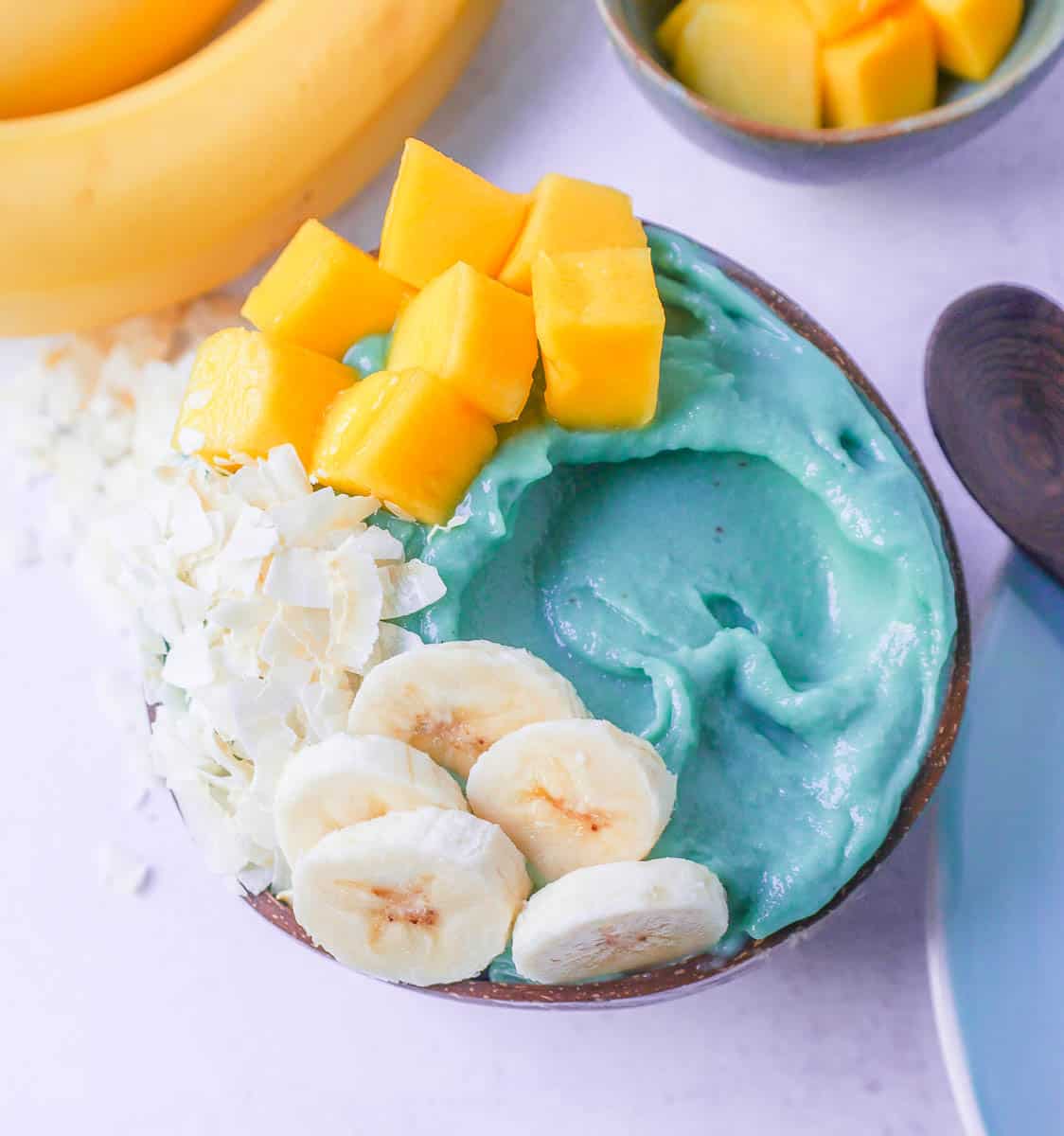 Blue Tropical Pineapple Coconut Smoothie Bowl:

This tropical smoothie bowl is absolutely beautiful and delicious with the addition of the blue spirulina powder which makes it a ocean blue color. Coconut Pineapple Smoothie Bowl Recipe.