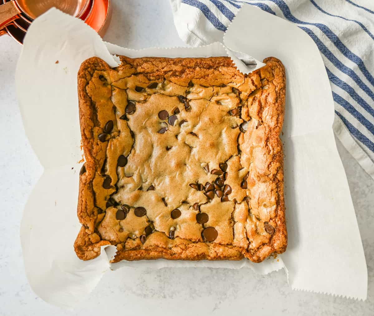 The Best Chocolate Chip Blondies Recipe Ever! How to make chewy, soft blondies from scratch. This is the most delicious and easiest chocolate chip blondie recipe.