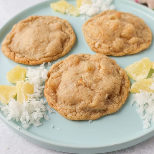 Coconut Pineapple Cookies. Soft chewy pina colada cookies with sweetened dried pineapple and sweet coconut flakes. These Hawaiian Pineapple Coconut Cookies are the perfect summer cookie.
