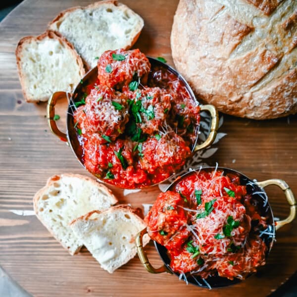 How to master the art of making easy homemade meatballs. This is the best homemade meatball recipe made with fresh ingredients! I will share all of my secrets to making the most perfect meatballs.