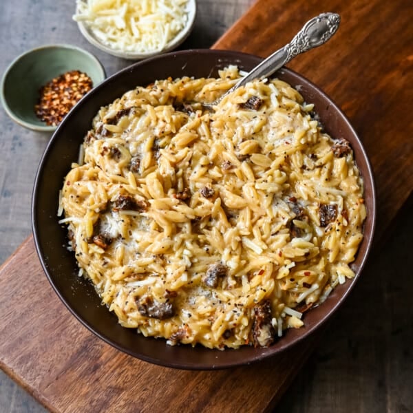 Boursin Cheese Sundried Tomato Orzo. A quick and easy one pot side dish made with orzo pasta in a creamy boursin cheese parmesan sundried tomato sauce.