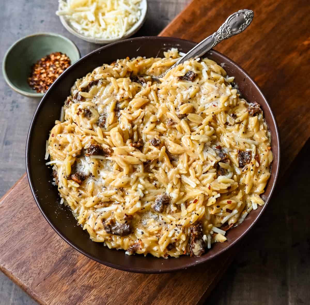 Boursin Cheese Sundried Tomato Orzo. A quick and easy one pot side dish made with orzo pasta in a creamy boursin cheese parmesan sundried tomato sauce. 