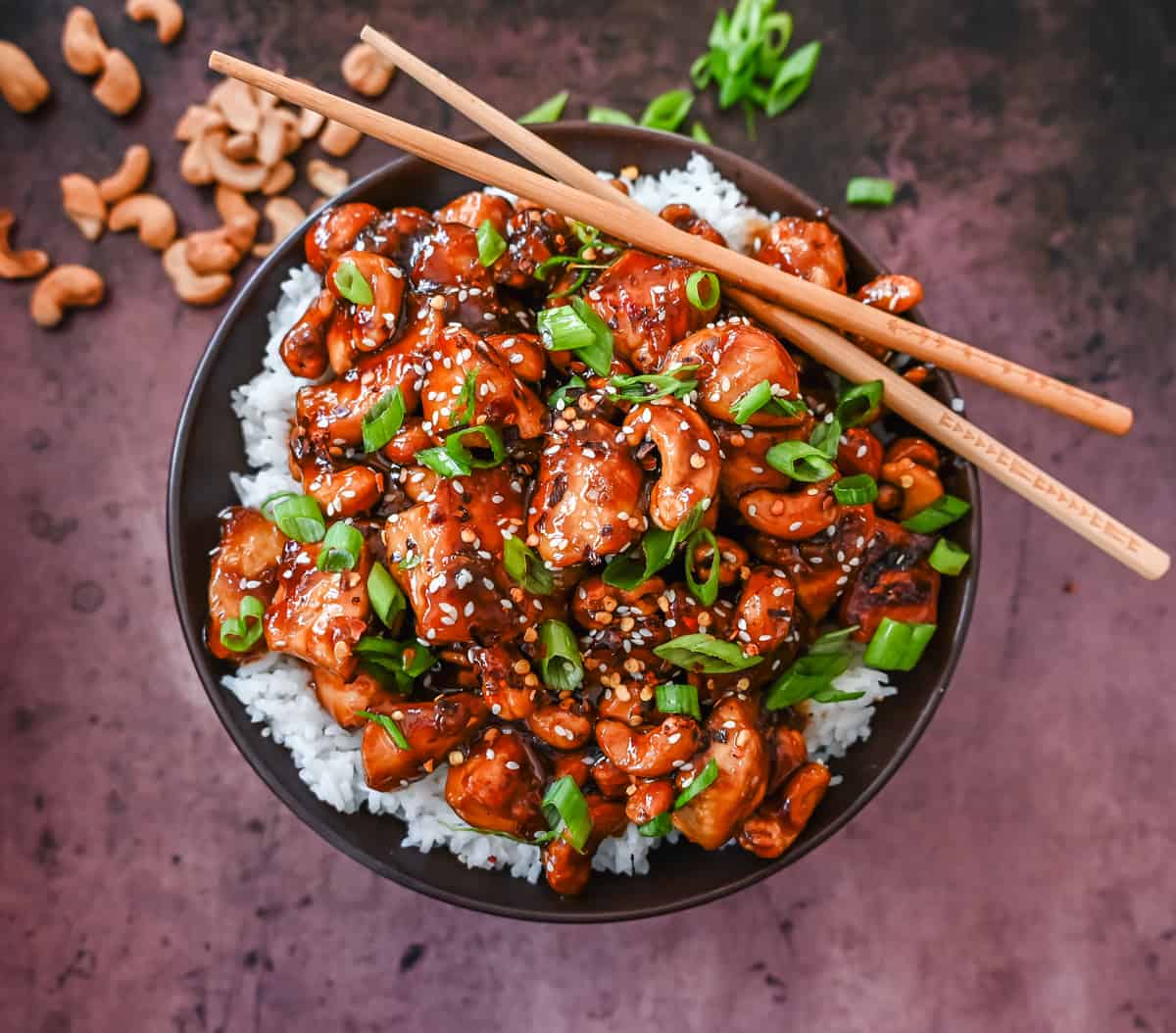 How to make Better than Take Out Cashew Chicken at home. This quick and easy cashew chicken is made with chicken, crunchy cashews, in a velvety homemade stir fry sauce.