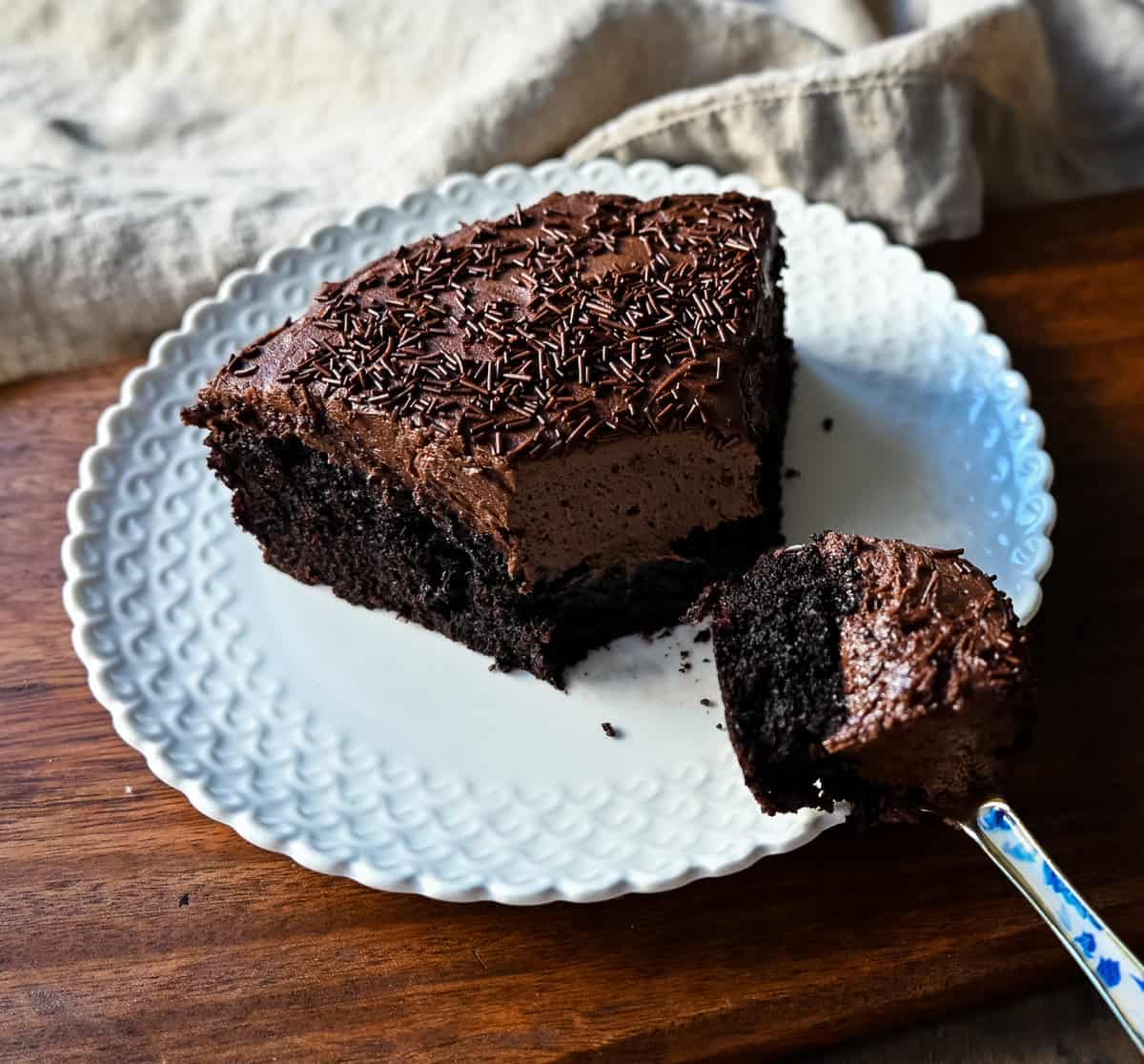 Chocolate Olive Oil Cake. Moist, rich chocolate cake made with olive oil and frosted with a homemade chocolate buttercream frosting. This is a decadent frosted chocolate cake recipe.