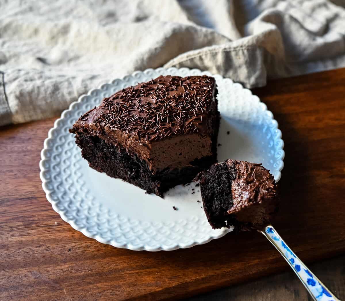 Chocolate Olive Oil Cake. Moist, rich chocolate cake made with olive oil and frosted with a homemade chocolate buttercream frosting. This is a decadent frosted chocolate cake recipe.