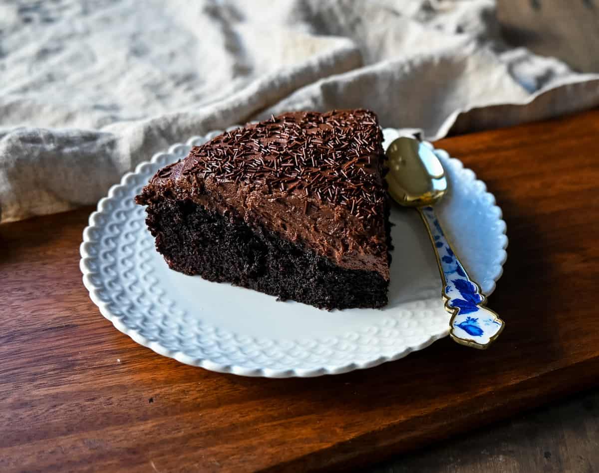 Chocolate Olive Oil Cake. Moist, rich chocolate cake made with olive oil and frosted with a homemade chocolate buttercream frosting. This is a decadent frosted chocolate cake recipe.