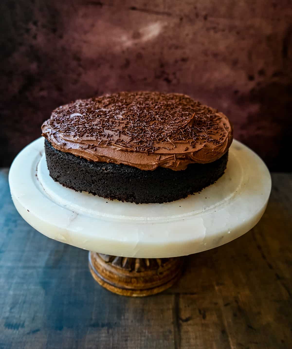 Chocolate Olive Oil Cake. Moist, rich chocolate cake made with olive oil and frosted with a homemade chocolate buttercream frosting. This is a decadent frosted chocolate cake recipe.