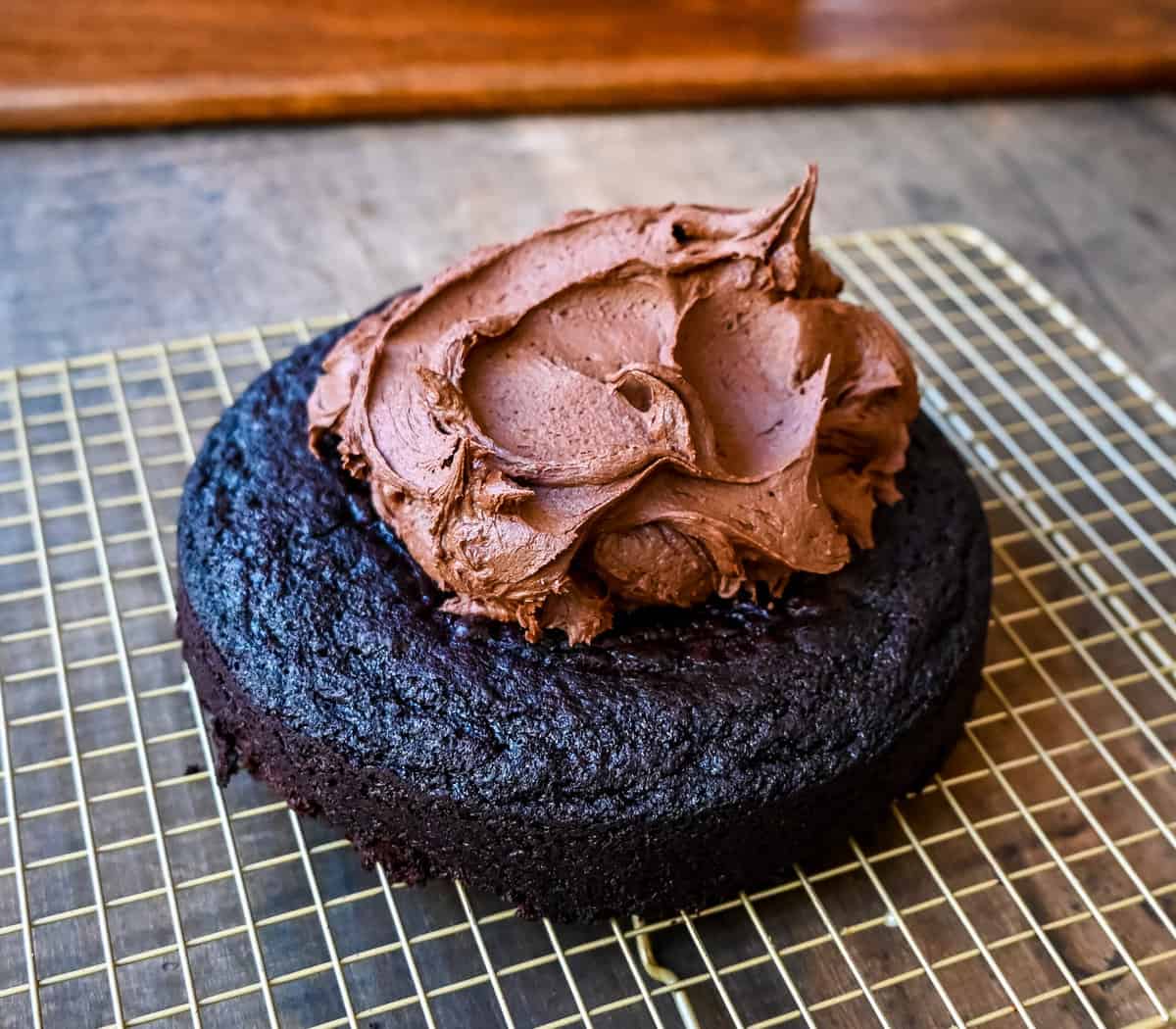 Chocolate Olive Oil Cake with Chocolate Frosting. Moist, rich chocolate cake made with olive oil and frosted with a homemade chocolate buttercream frosting. This is a decadent frosted chocolate cake recipe.