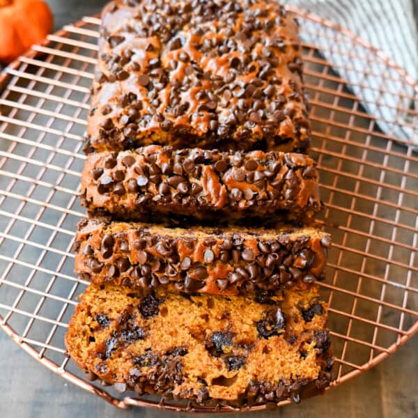 How to make the best pumpkin chocolate chip bread ever! This moist pumpkin spiced bread with chocolate chips will be a Fall favorite. It is the most perfect chocolate chip pumpkin bread.