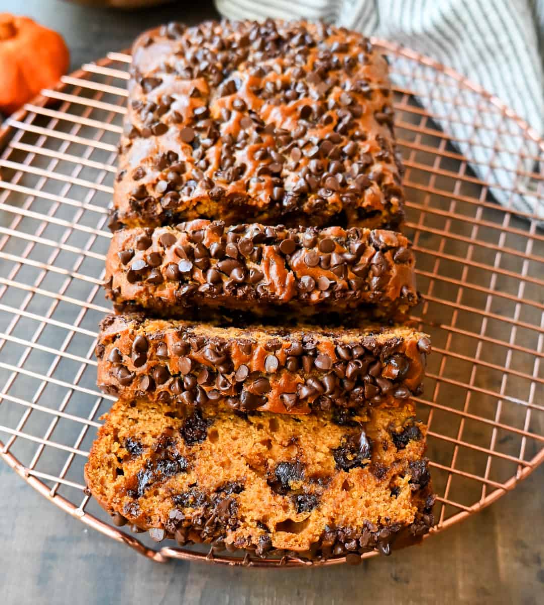 How to make the best pumpkin chocolate chip bread ever! This moist pumpkin spiced bread with chocolate chips will be a Fall favorite. It is the most perfect chocolate chip pumpkin bread.