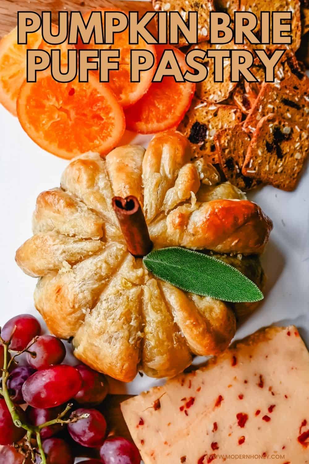 Pumpkin Shaped Baked Brie Puff Pastry. This festive Fall Pumpkin Baked Brie is the perfect appetizer or centerpiece for your charcuterie board. Flaky puff pastry baked with creamy brie cheese and pumpkin butter or fig jam is the perfect salty sweet combination.