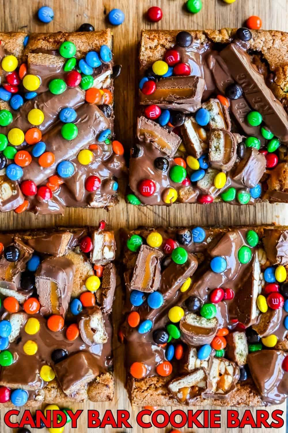 Candy Bar Cookie Bars. An ooey gooey cookie bar topped with an assortment of candy bars. The perfect candy bar blondie dessert to make with Halloween candy.