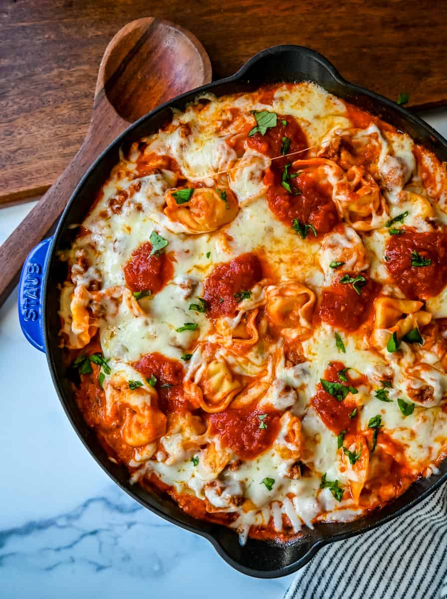 Cheese Tortellini with Sausage Ragu. This quick and easy 20 minute pasta bake is made with cheese tortellini in an Italian sausage ragu sauce and topped with cheesy melted mozzarella cheese. Everyone loves this easy pasta dinner made with only 5 ingredients!