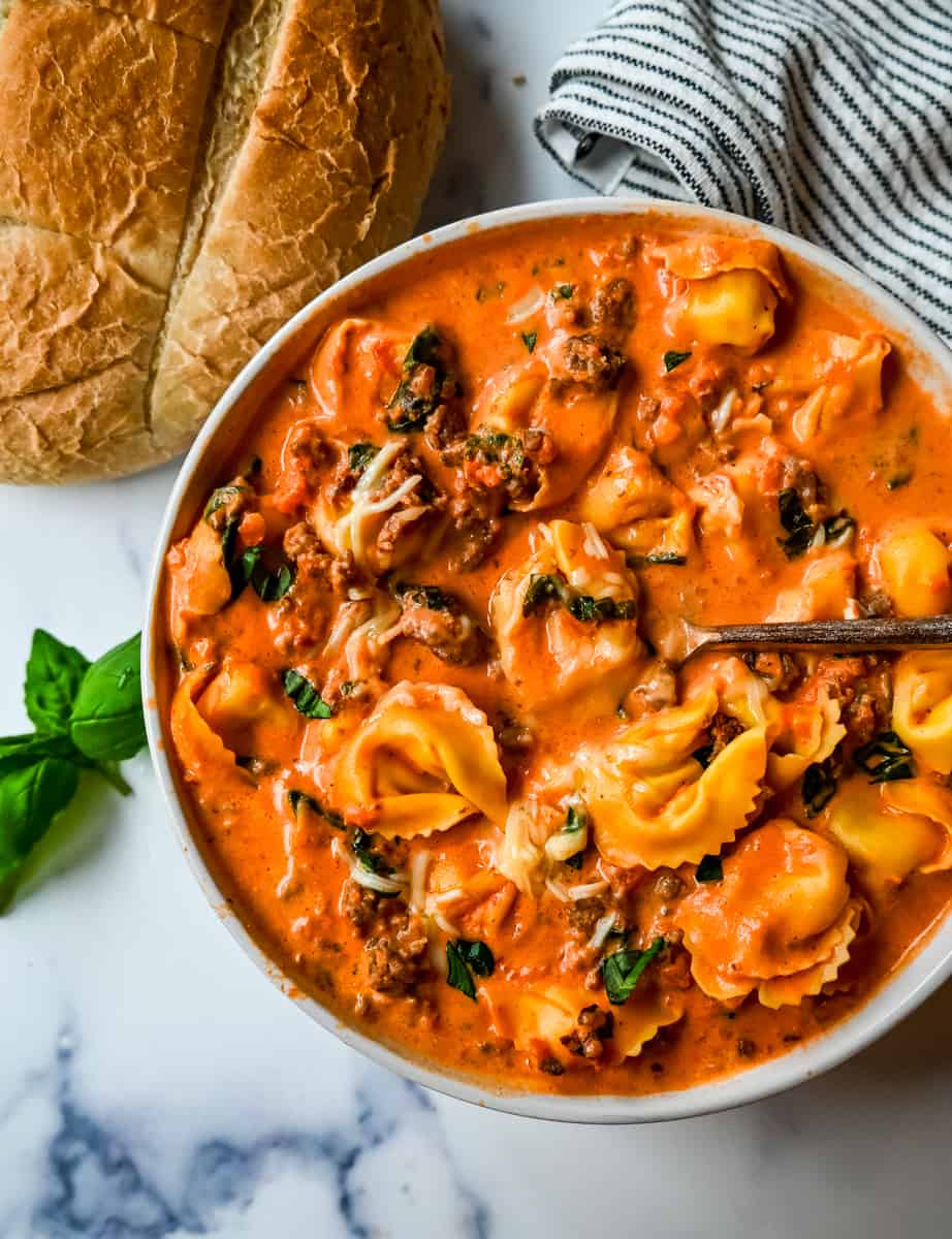 Creamy Sausage Tortellini Soup. An easy 6-ingredient Sausage Tortellini Soup is a family favorite. This popular soup recipe can be made on the stovetop or in a slow cooker. Rich, creamy, flavorful soup that everyone raves about!