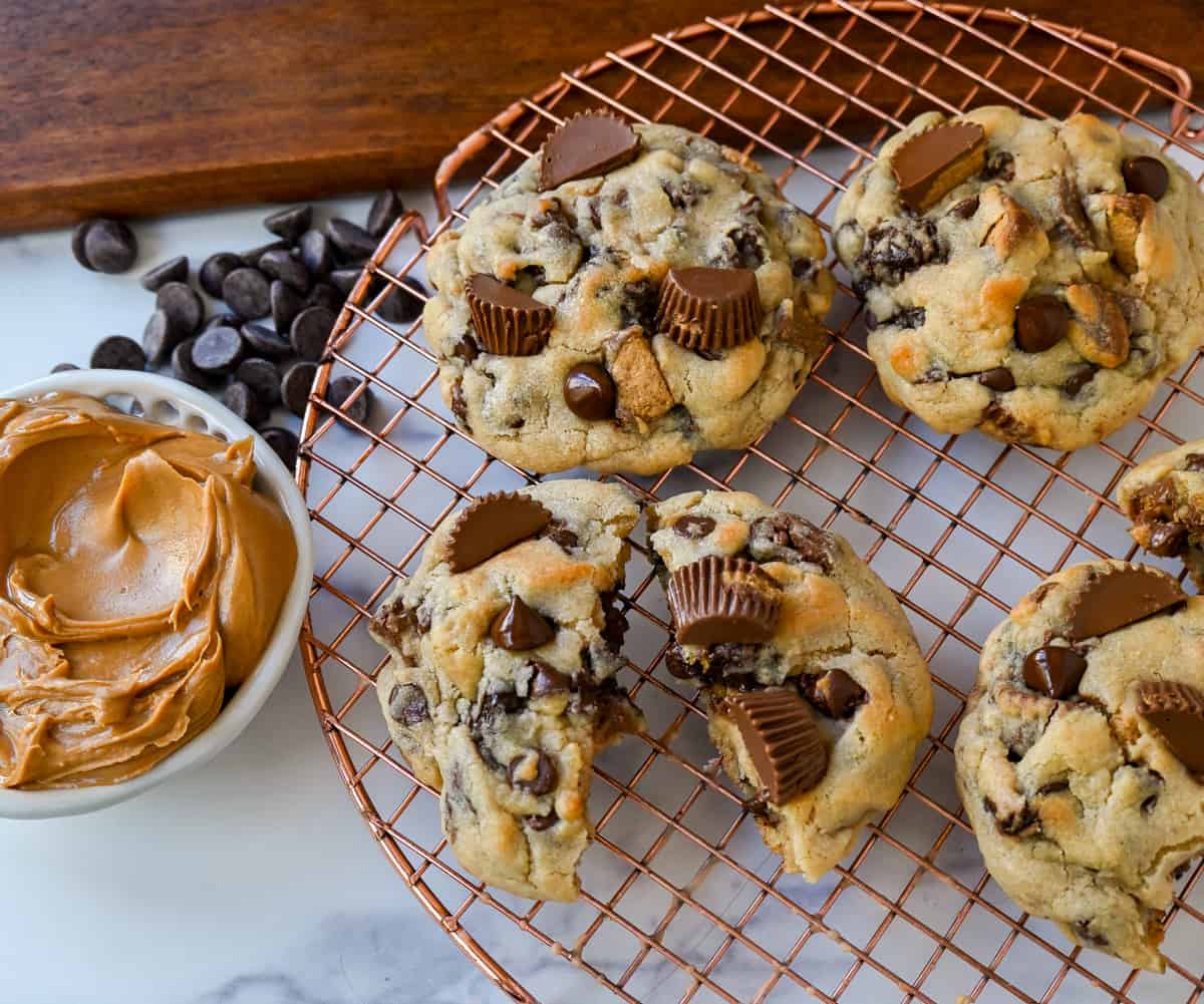 Reese's Chocolate Peanut Butter Cup Cookies. Soft, chewy, thick bakery-style chocolate peanut butter cup cookies made with Reese's peanut butter cups. Chocolate peanut butter lovers will love these cookies!