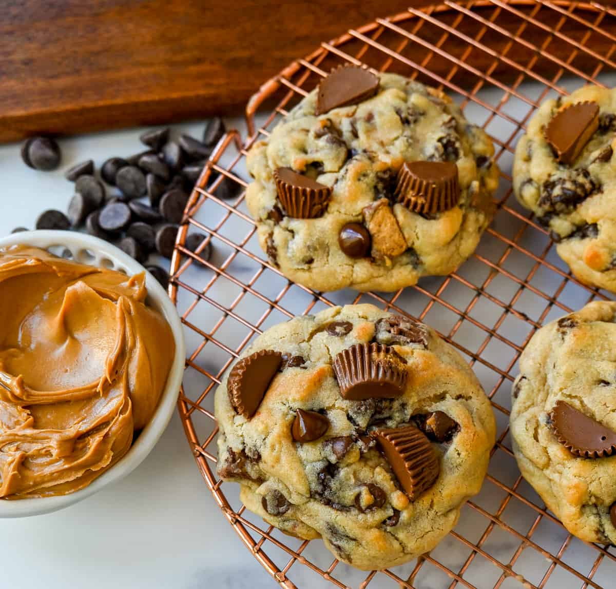 Reese's Chocolate Peanut Butter Cup Cookies. Soft, chewy, thick bakery-style chocolate peanut butter cup cookies made with Reese's peanut butter cups. Chocolate peanut butter lovers will love these cookies!