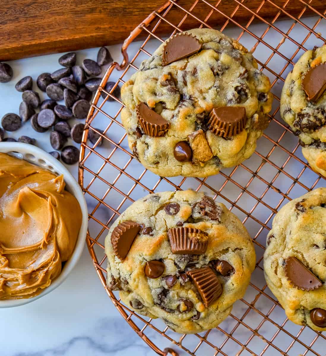 Reese's Chocolate Peanut Butter Cup Cookies. Soft, chewy, thick bakery-style chocolate peanut butter cup cookies made with Reese's peanut butter cups. Chocolate peanut butter lovers will love these cookies!