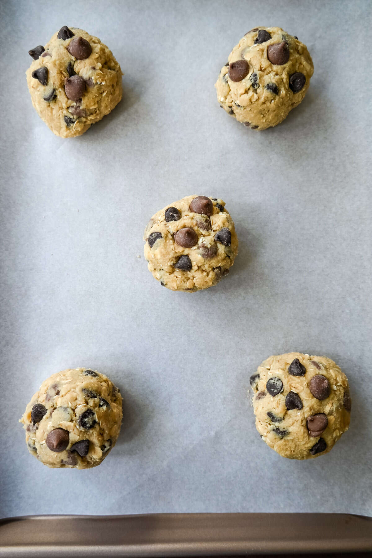 Bakery Style Oatmeal Chocolate Chip Cookie Dough on baking sheet