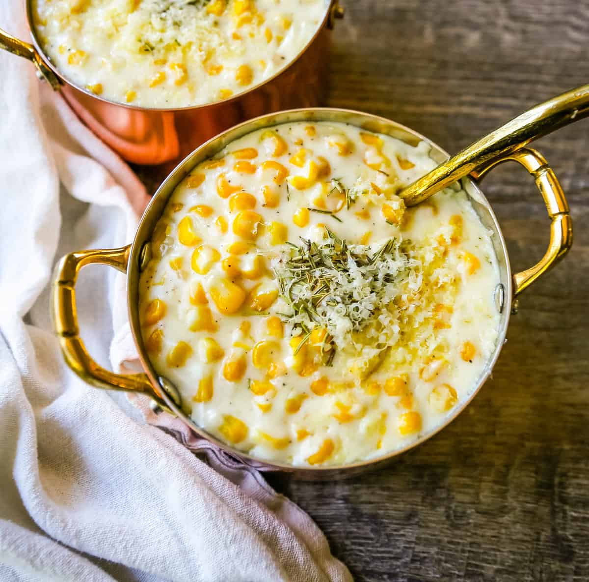 Creamed Corn is made with corn, fresh cream, butter, parmesan cheese, and salt. This is the best creamed corn recipe! We serve this every Thanksgiving and it is the most popular side dish at the table.