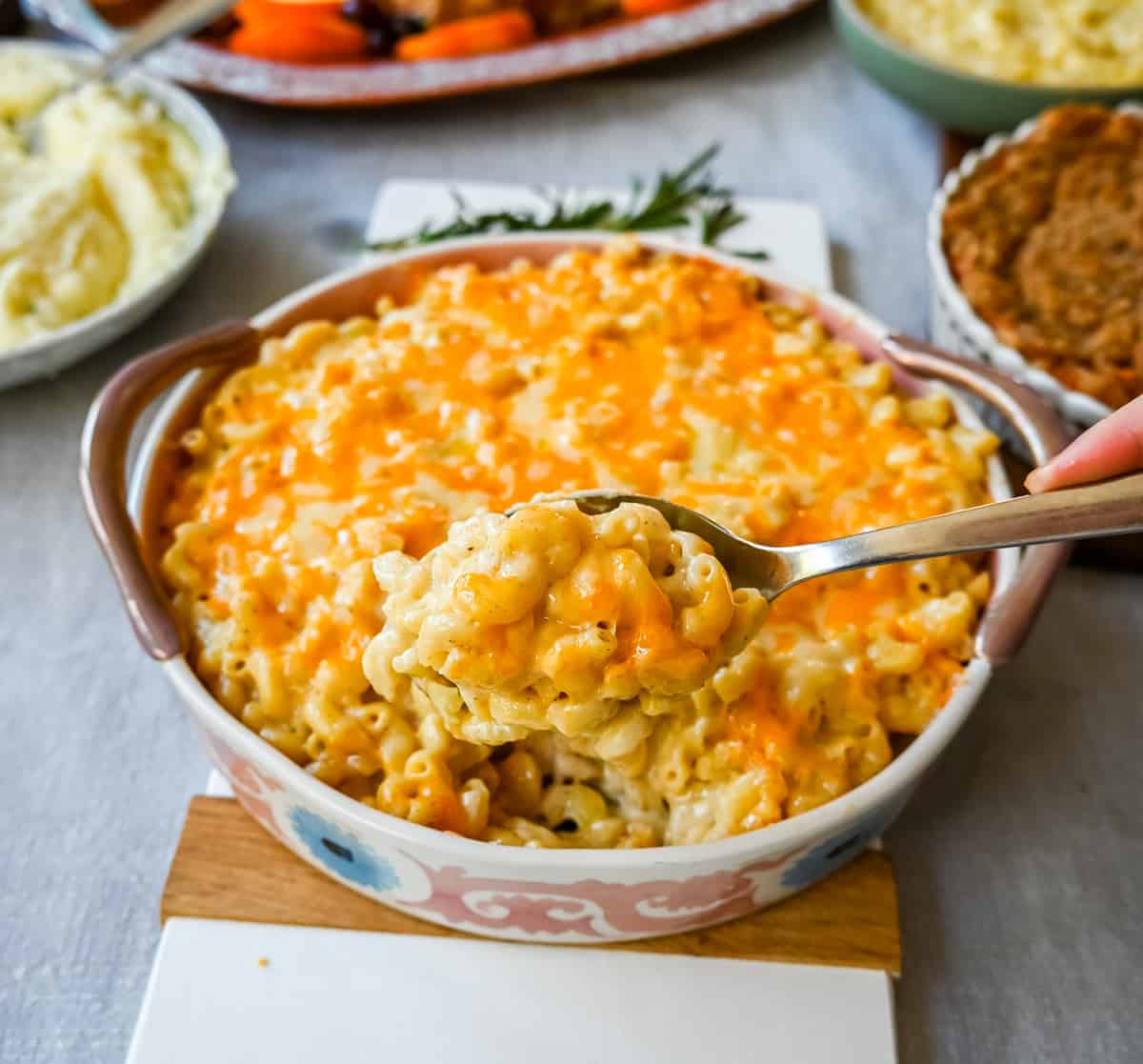 Homemade Mac and Cheese. How to make the richest, creamiest, cheesiest mac and cheese that everyone will love. This homemade macaroni and cheese is the perfect comfort food recipe.