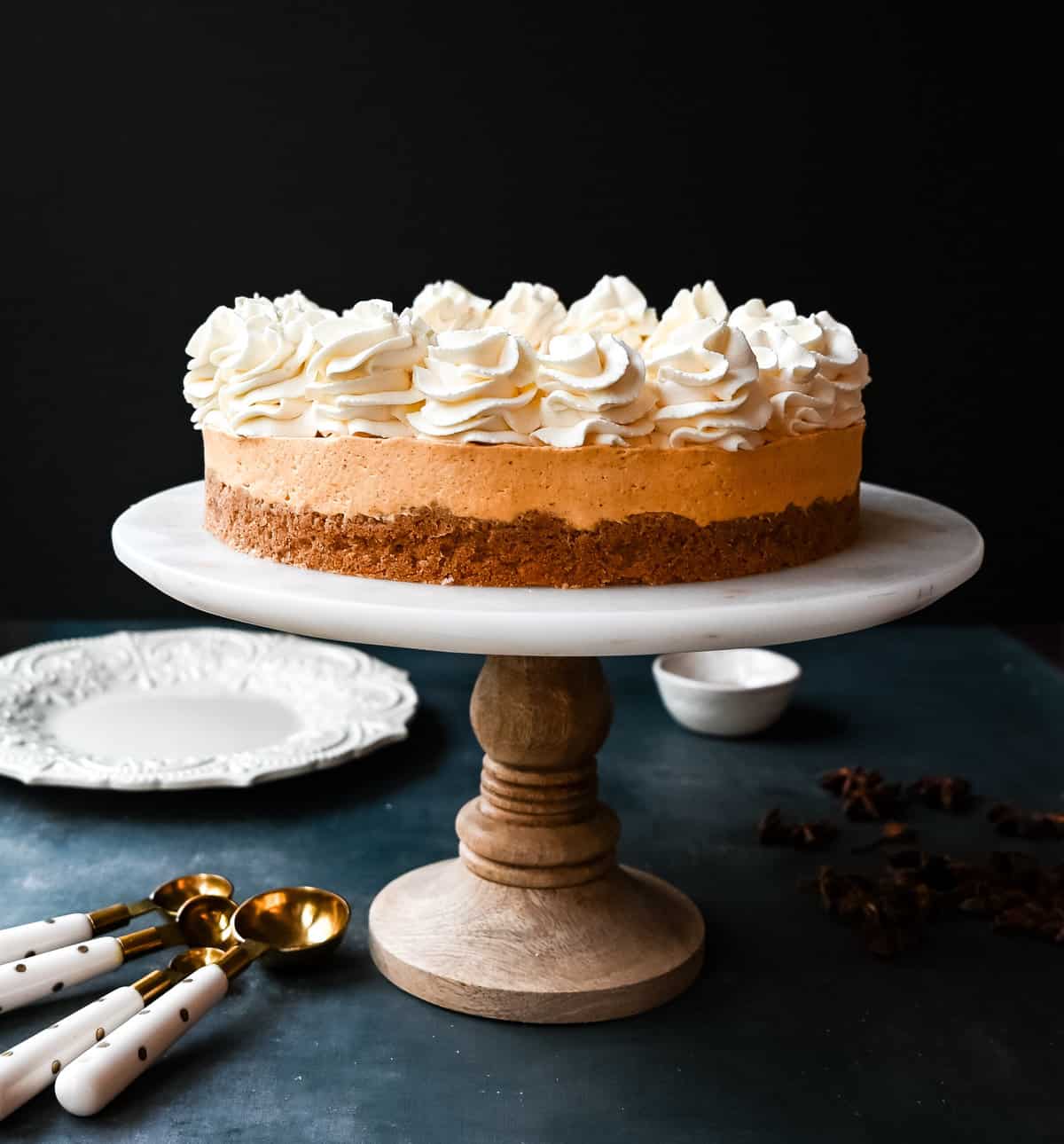 No-Bake Pumpkin Cheesecake. Creamy, smooth pumpkin cheesecake filling in a buttery graham cracker crust topped with whipped cream. This easy, no-bake dessert is perfect for Fall or Thanksgiving gatherings.