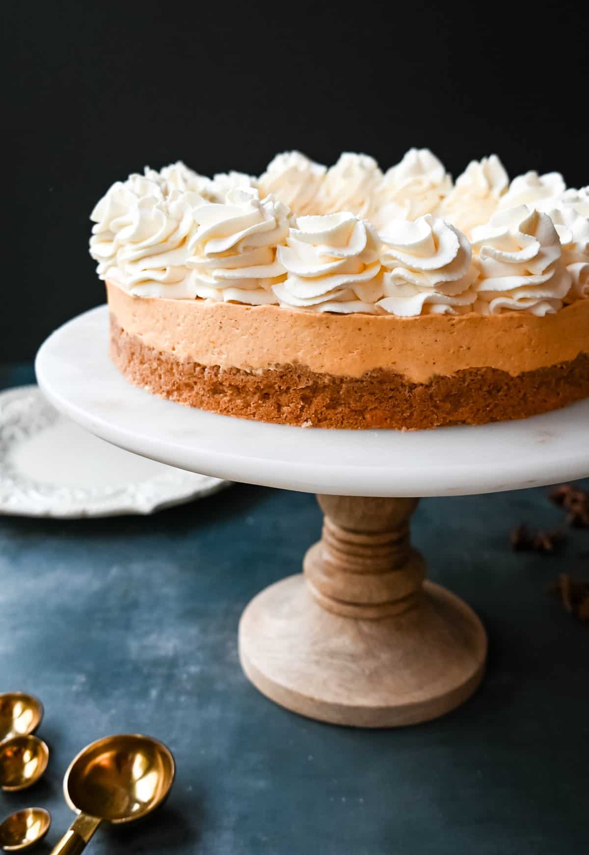 No-Bake Pumpkin Cheesecake. Creamy, smooth pumpkin cheesecake filling in a buttery graham cracker crust topped with whipped cream. This easy, no-bake dessert is perfect for Fall or Thanksgiving gatherings.