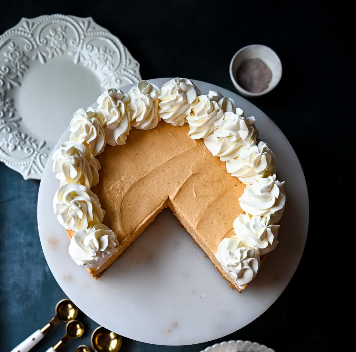 No-Bake Pumpkin Cheesecake. Creamy, smooth pumpkin cheesecake filling in a buttery graham cracker crust topped with whipped cream. This easy, no-bake dessert is perfect for Fall or Thanksgiving gatherings.