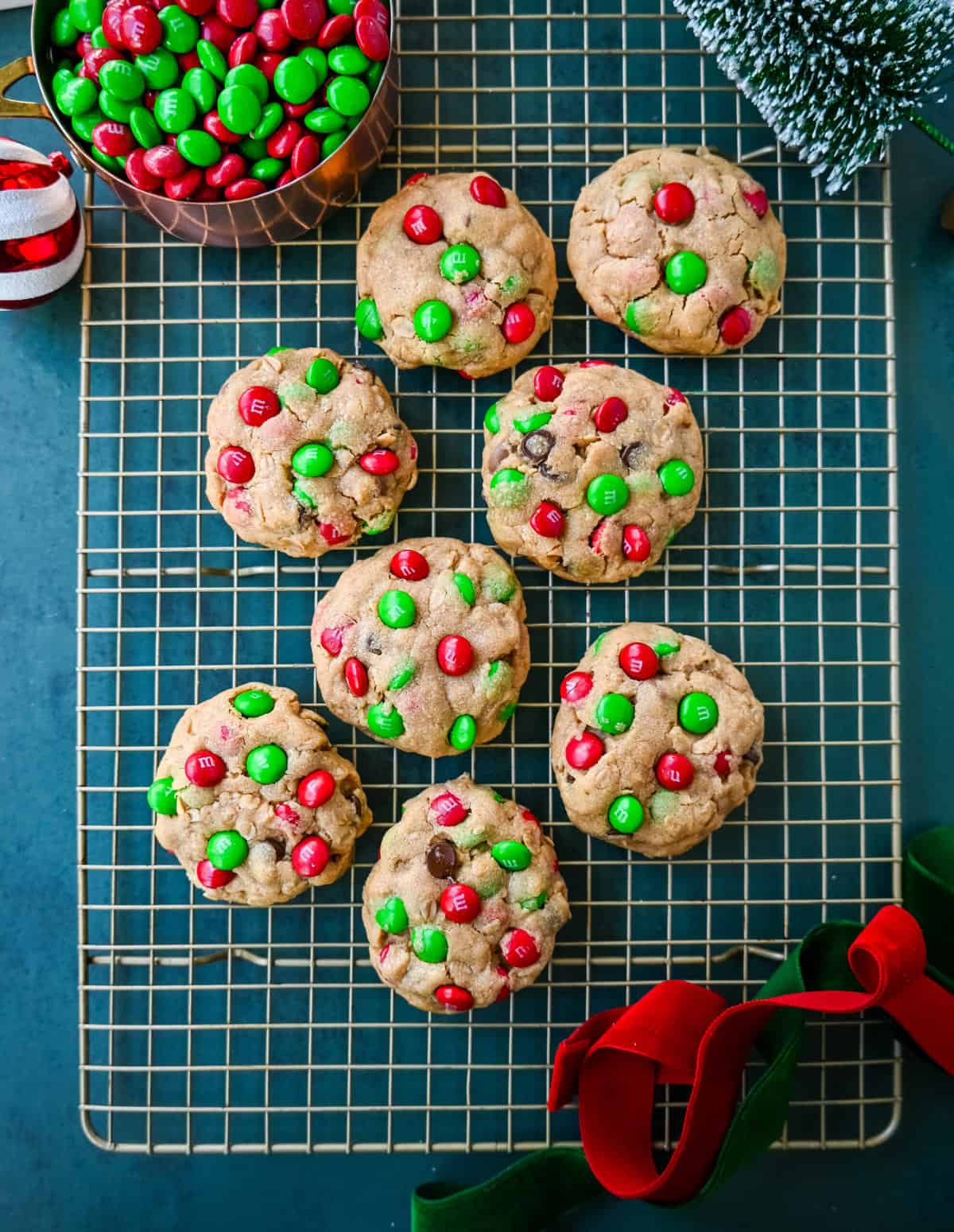 Christmas Monster Cookies. These popular, soft, thick, and chewy Christmas Monster Cookies are made with oats, peanut butter, chocolate chips, and holiday red and green M & M's. They are an easy Christmas cookie that can be made in minutes.