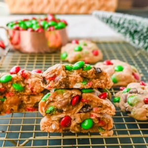Christmas M & M Cookies. These popular, soft, thick, and chewy Christmas Monster Cookies are made with oats, peanut butter, chocolate chips, and holiday red and green M & M's. They are an easy Christmas cookie that can be made in minutes.