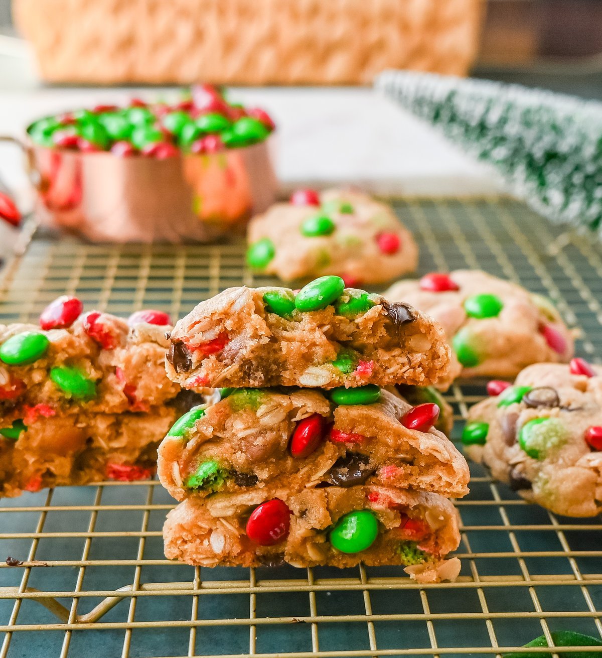 Christmas Monster Cookies. These popular, soft, thick, and chewy Christmas Monster Cookies are made with oats, peanut butter, chocolate chips, and holiday red and green M & M's. They are an easy Christmas cookie that can be made in minutes.