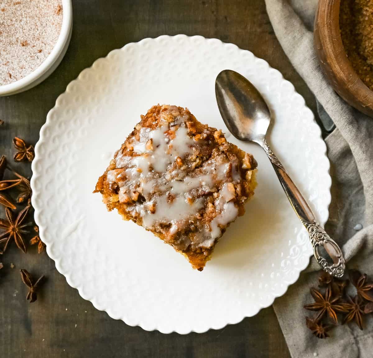 Best Coffee Cake Recipe. This cinnamon brown sugar sour cream coffee cake is made with a buttery cake layered with a brown sugar cinnamon layer and topped with a streusel topping and a sweet glaze. The best coffee cake recipe perfect for breakfast or brunch.