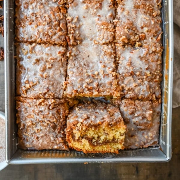 Best Coffee Cake Recipe. This cinnamon brown sugar sour cream coffee cake is made with a buttery cake layered with a brown sugar cinnamon layer and topped with a streusel topping and a sweet glaze. The best coffee cake recipe perfect for breakfast or brunch.