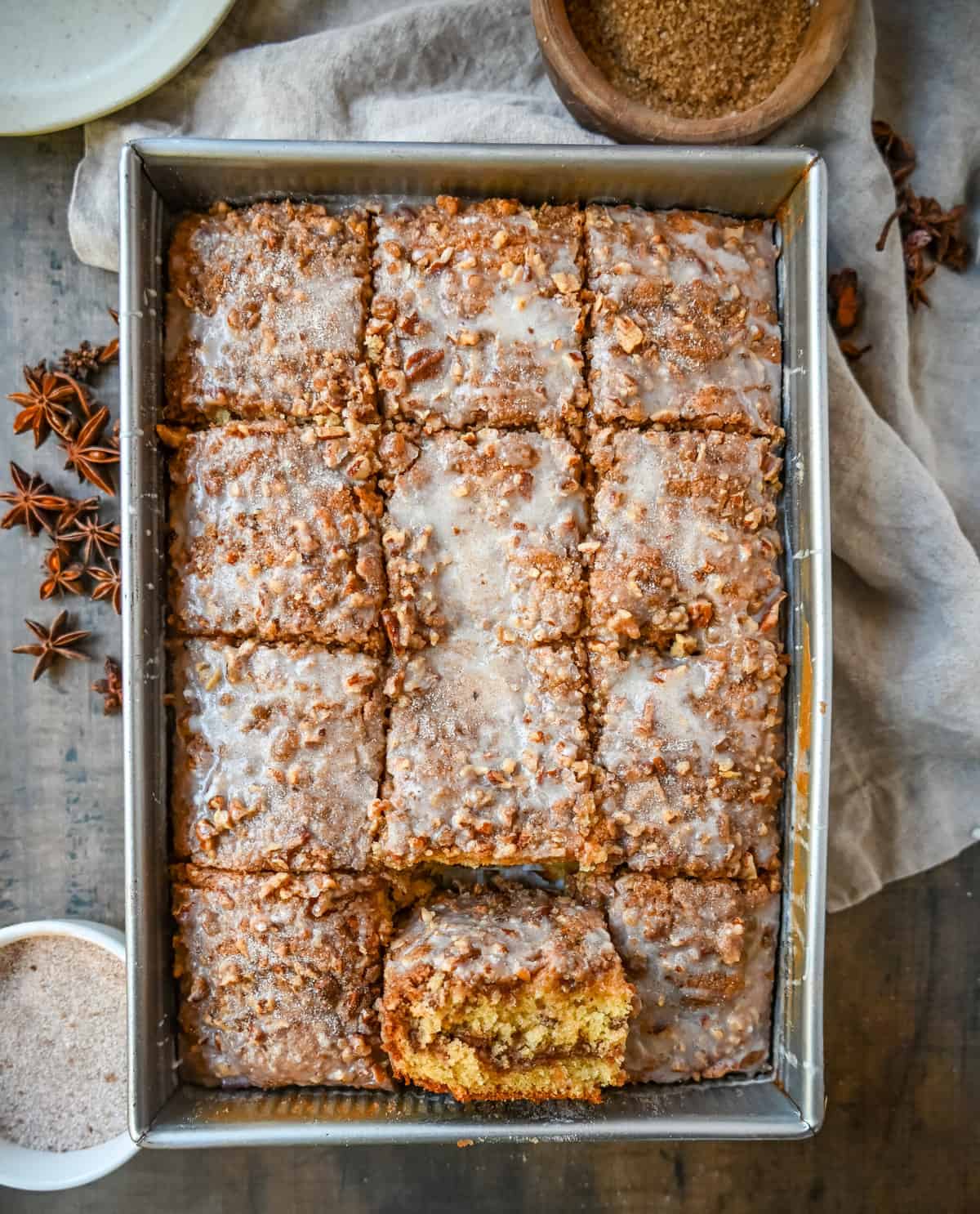 Best Coffee Cake Recipe. This cinnamon brown sugar sour cream coffee cake is made with a buttery cake layered with a brown sugar cinnamon layer and topped with a streusel topping and a sweet glaze. The best coffee cake recipe perfect for breakfast or brunch or Christmas morning breakfast.