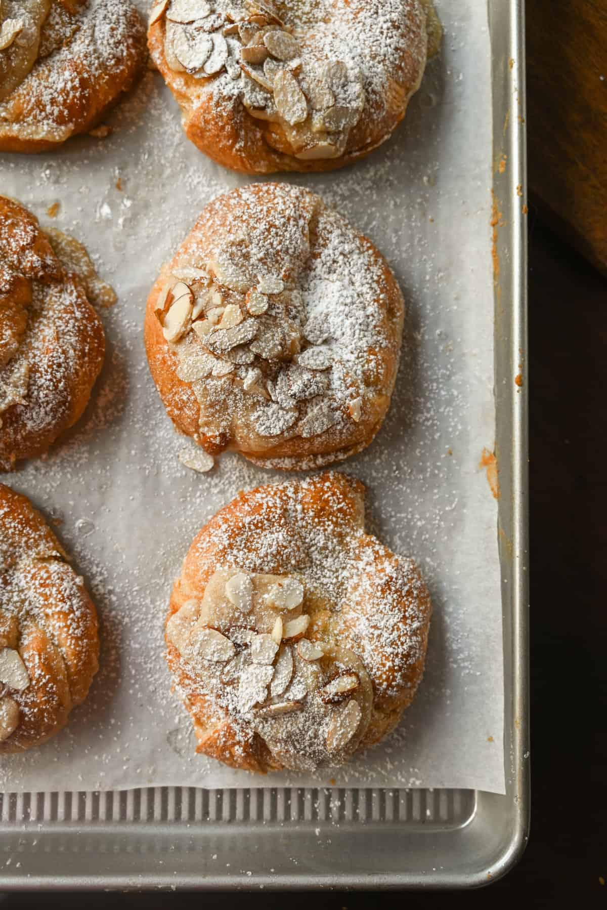 Dust almond croissants with powdered sugar