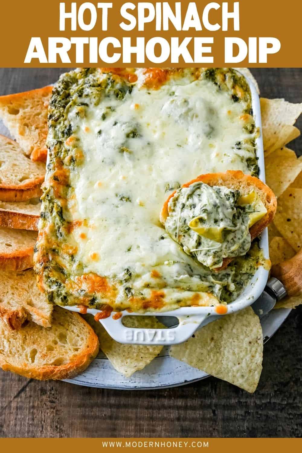 Hot Spinach Artichoke Dip. This easy spinach artichoke dip is creamy and cheesy and always a crowd pleaser! This warm spinach artichoke dip is served with tortilla chips, crackers, or bread for the perfect dip recipe.