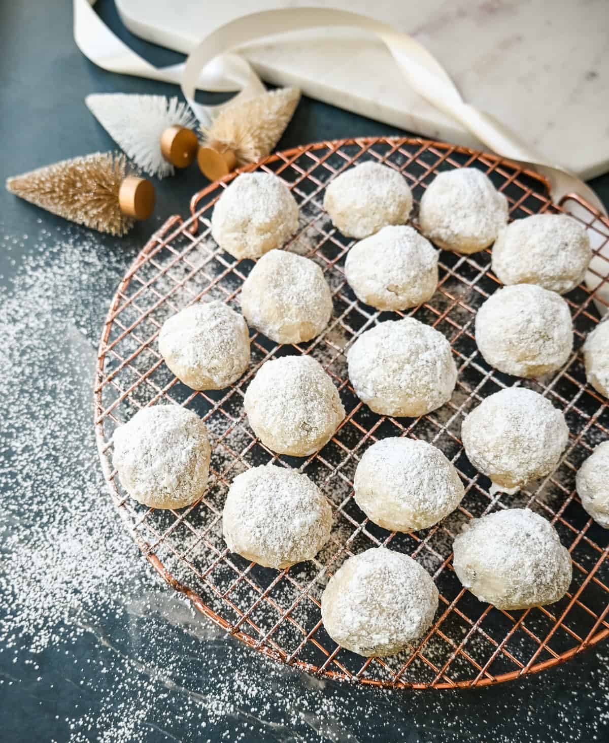 Mexican Wedding Cookies (Snowball Cookies). These buttery, nutty, Mexican wedding cookies are so easy to make and call for only 5 ingredients. These melt-in-your-mouth cookies are perfect to make during the holidays and everyone loves them. The perfect Christmas cookie recipe. 