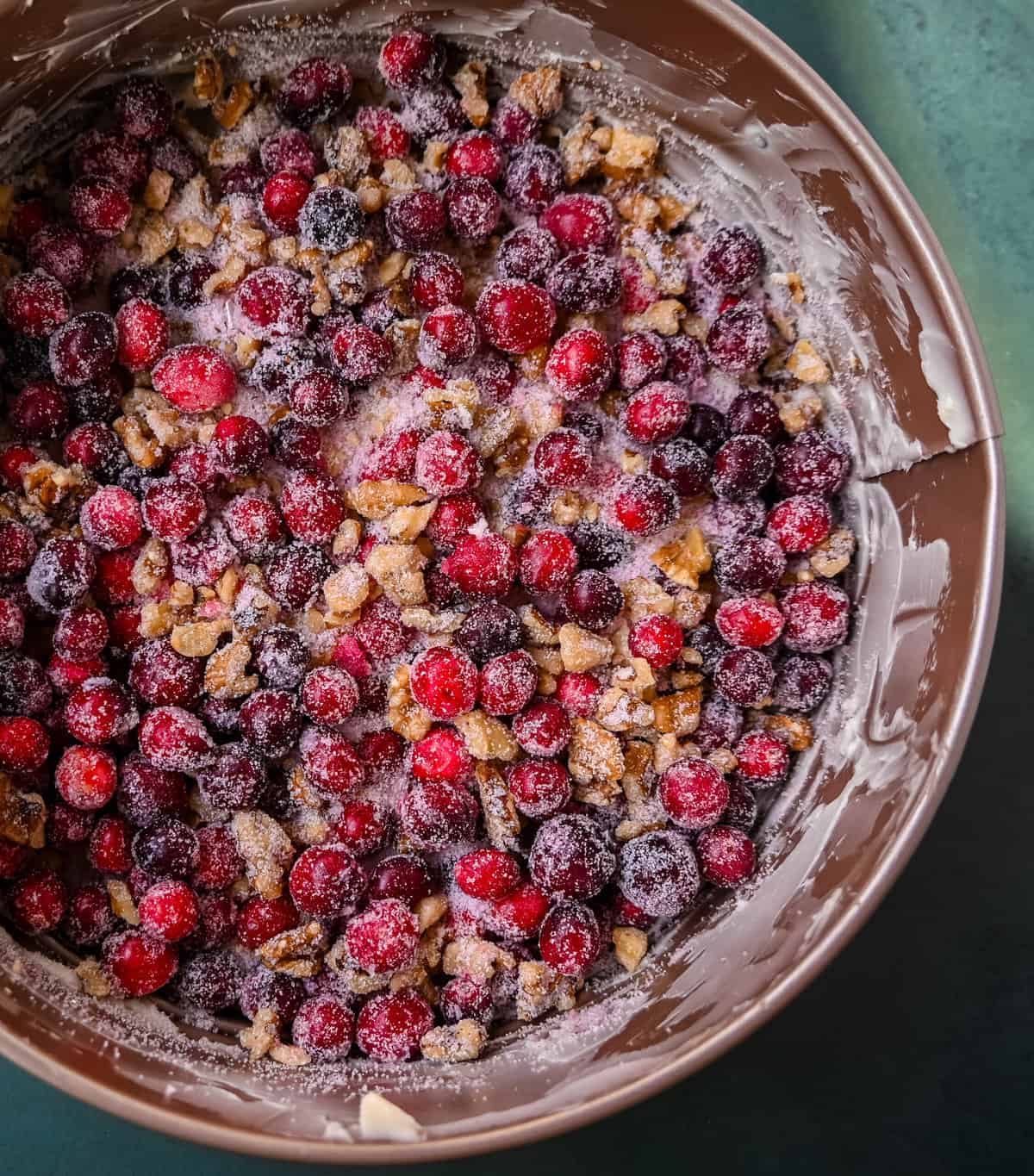 Nantucket Cranberry Pie cranberries sugar and nuts in pan