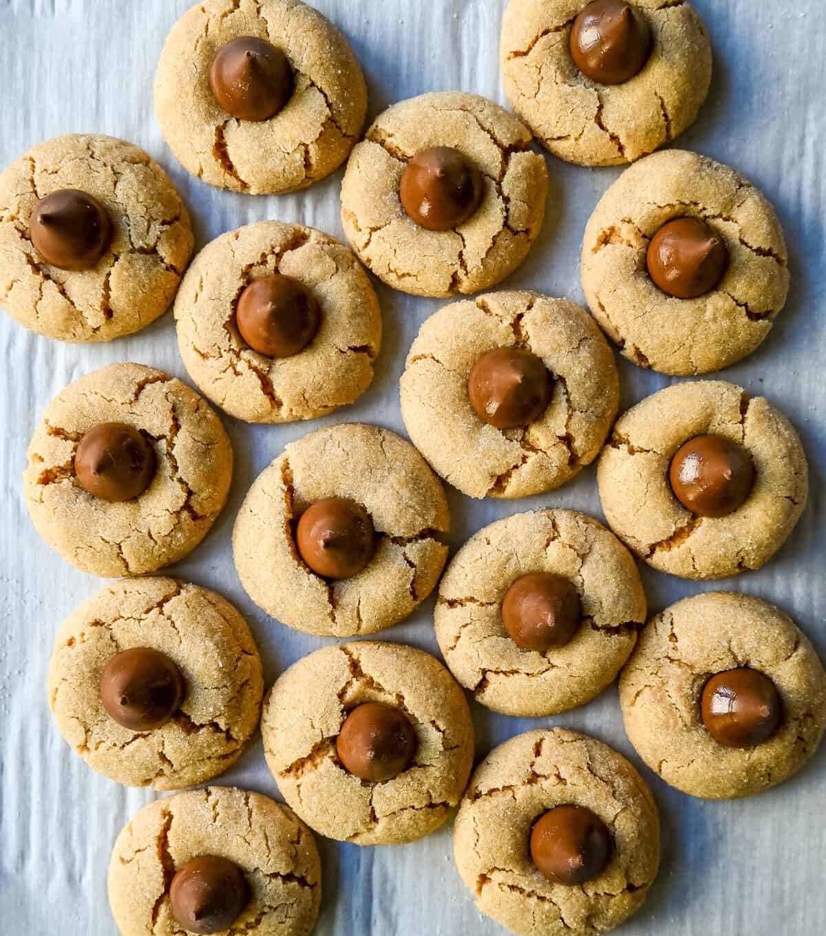 Easy Peanut Butter Blossoms. This popular soft and chewy peanut butter cookie with a Hershey's chocolate kiss in the center is the classic Christmas cookie. This recipe has been in my family for over 60 years and is the best peanut butter blossom recipe.